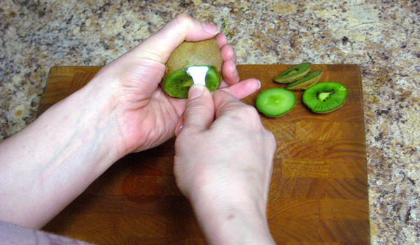 peel kiwi with a spoon