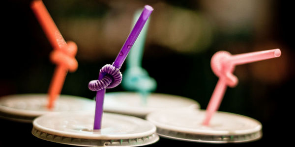 Drink coffee through a straw